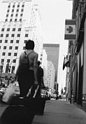 Artistic photograph of a man dragging a suitcase