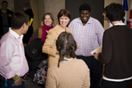 Principal Heather Munroe-Blum shares a lighter moment with a group of students after Town Hall including Lucy Erickson (left), U2 Arts and Science, and Adrian Angus (right), Vice-President (University Affairs), Students’ Society of McGill University.