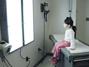 Photo of a girl in a doctor's examination office