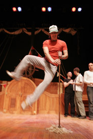 Music undergrad Jonathan Patterson kicks up his heels at a rehearsal for the McGill Savoy Society's 41st annual production - H.M.S. Pinafore (or, the Lass that Loved a Sailor).
